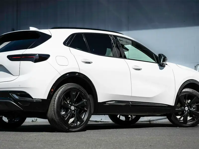 White Buick Envista crossover, rear three-quarter view